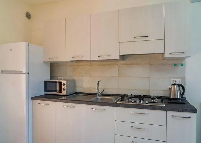 Ferienhaus Residenziale Trilocale 4 Posti Letto Via Oristano *